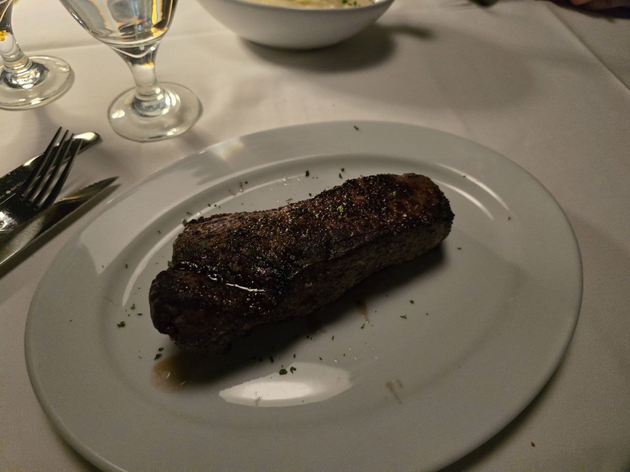 14oz New York Strip with dark caramelized sear at Ocean Prime Orlando